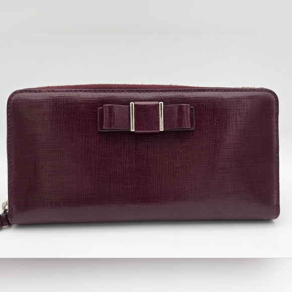 Coach Handbags - Coach Burgundy Patent Leather Wallet with Bow Accent
